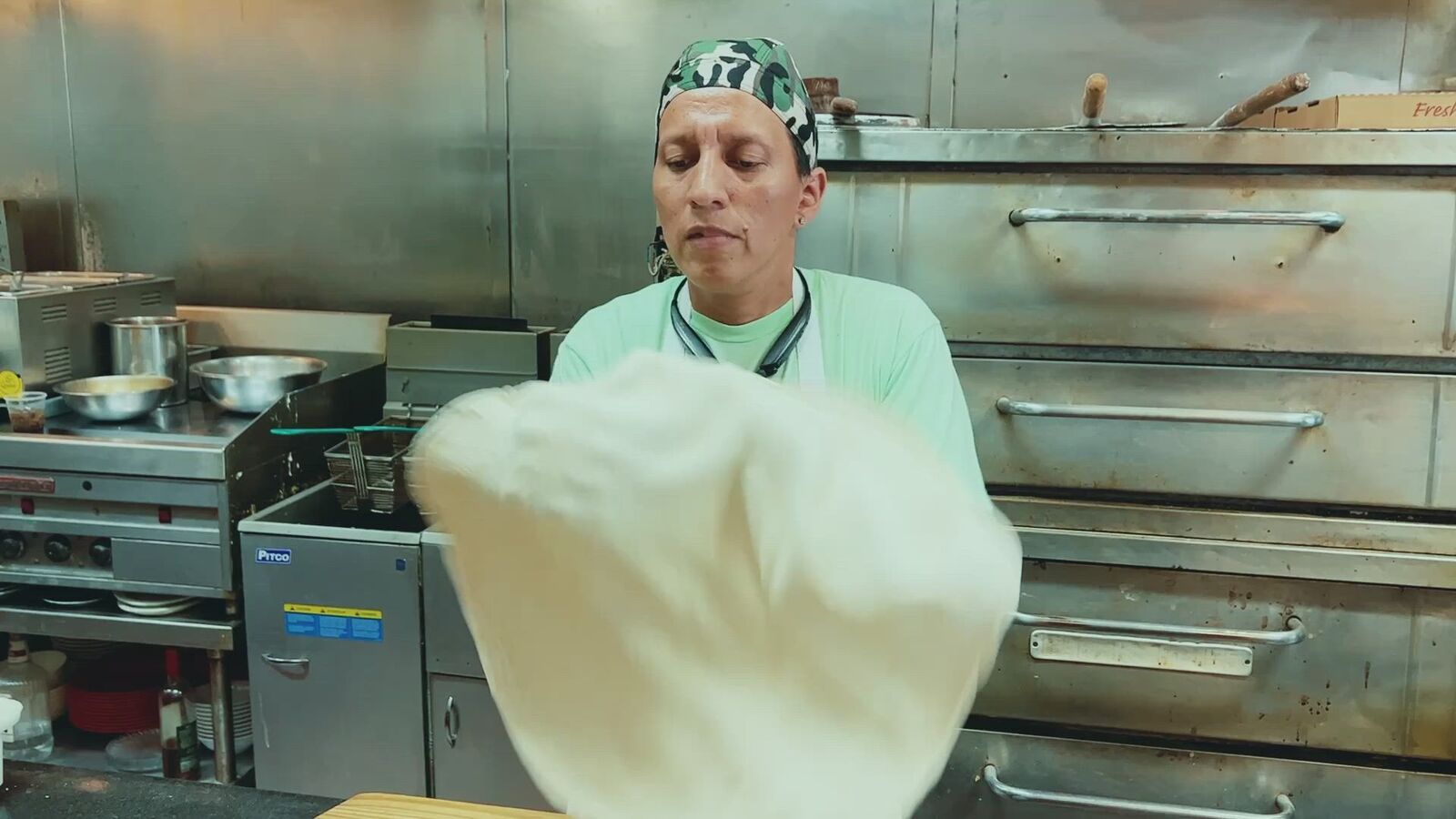 Fresh dough being stretched in the Napoli kitchen