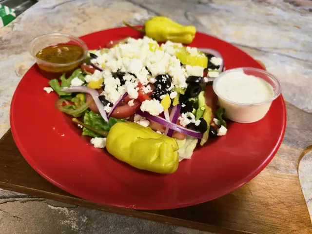 Greek salad with feta, olives and pepperoncini